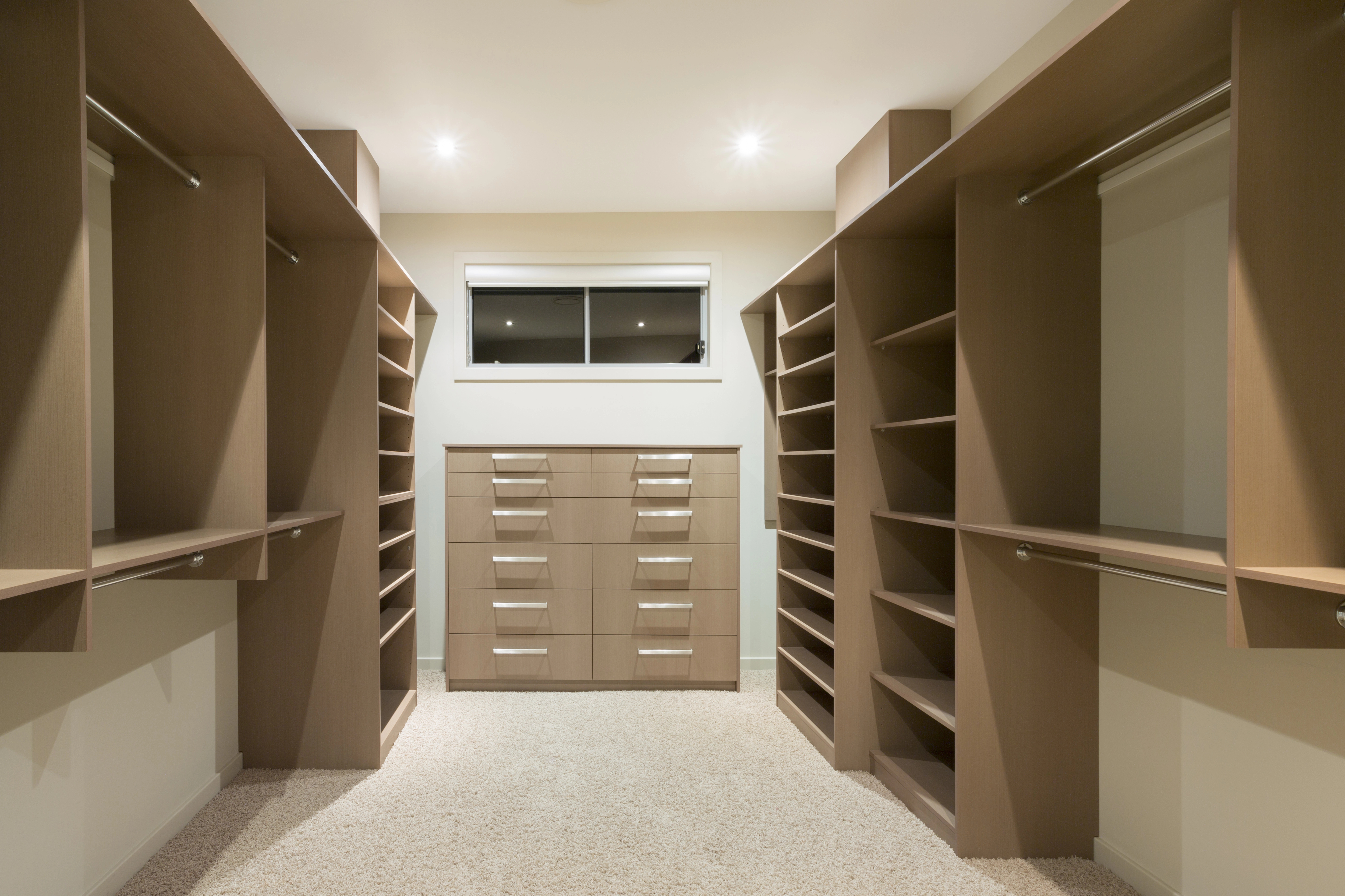 Walk-In Closets Designed for Power Couples: Two Worlds, One Space